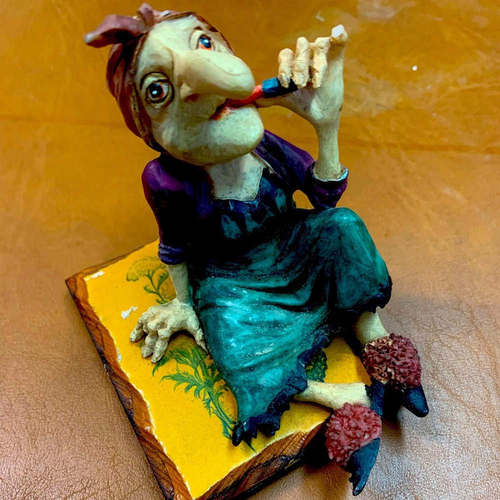 Vintage Kitchen Witch putting on lipStick